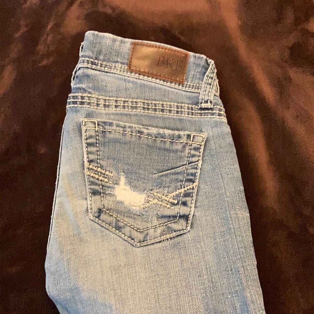 BKE distressed boot cut jeans
